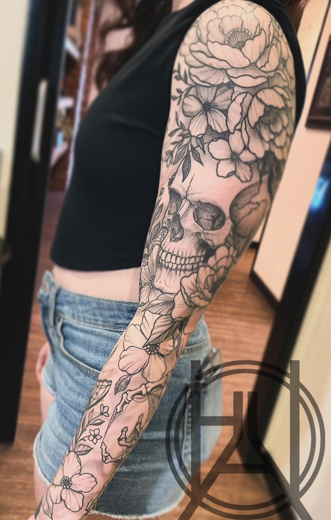 Floral skull full sleeve — dot work and fine line